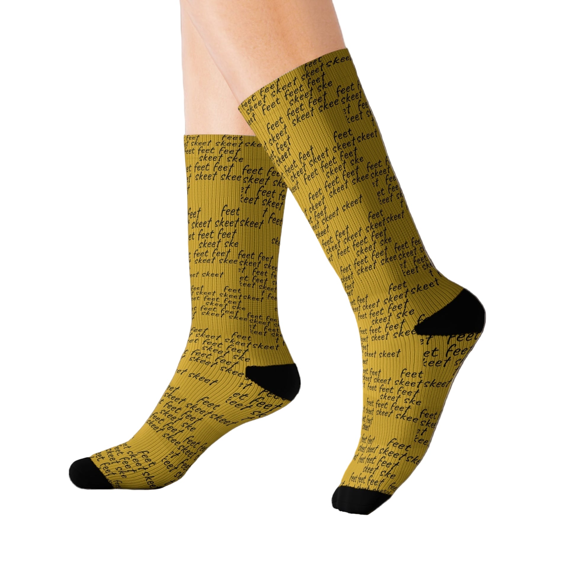 Mustard yellow sock with text "feet feet feet, skeet skeet skeet"